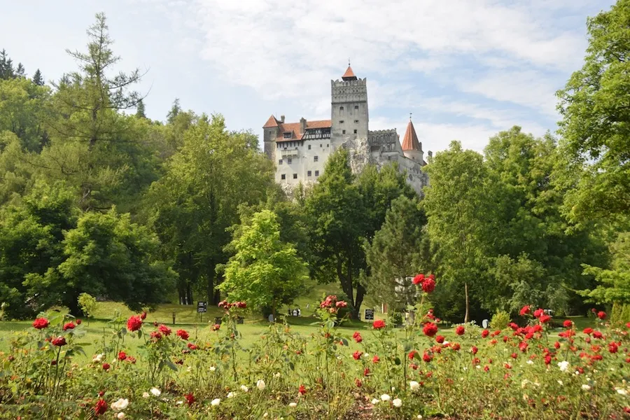 Bran Castle in spring with green Transylvanian hills