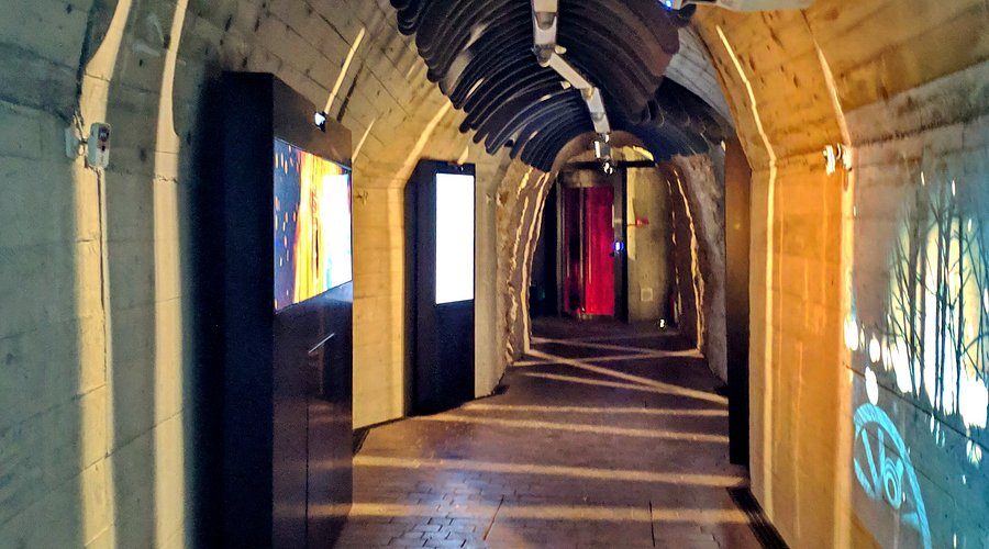 The Time Tunnel multimedia elevator at Bran Castle — a modern installation inside the castle well shaft