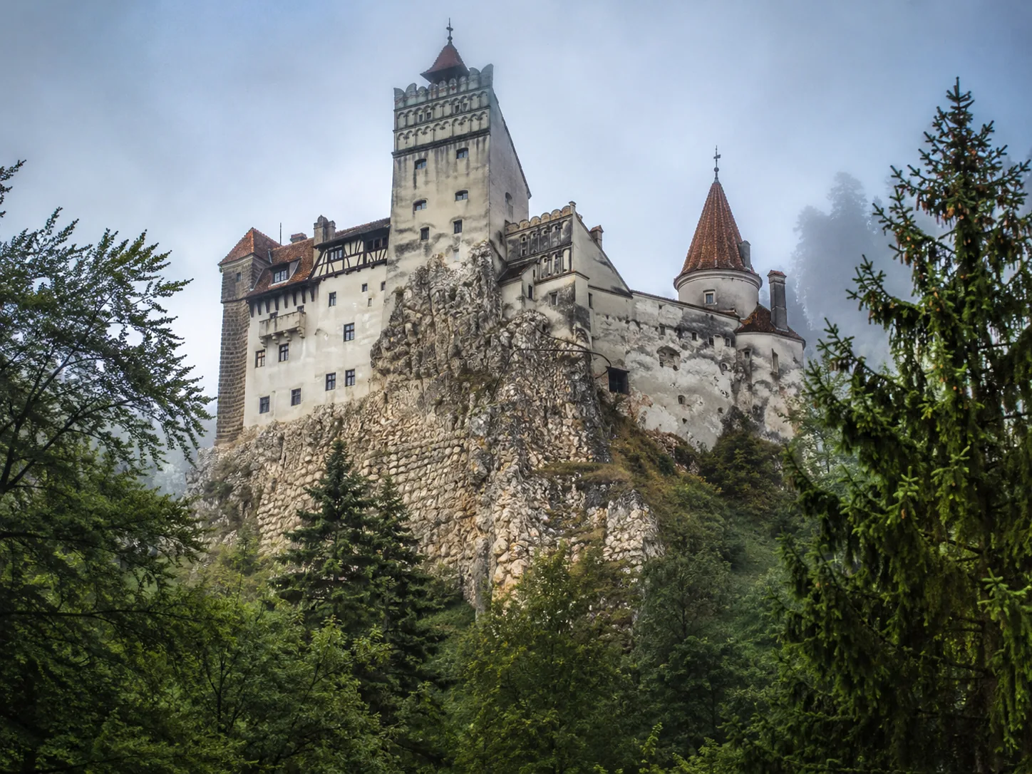 Bran Castle perched on its rock above the Bran Gorge