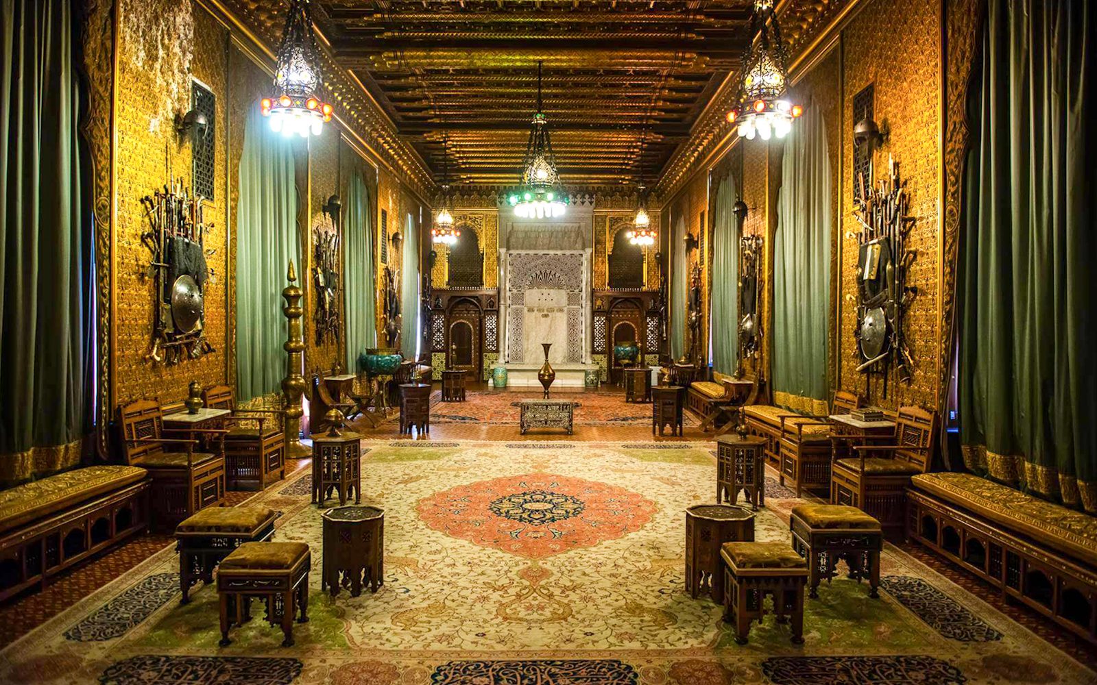 The throne room inside Bran Castle with carved wooden throne and period furnishings